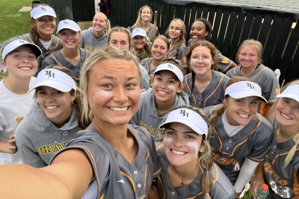 Smiling softball team selfie